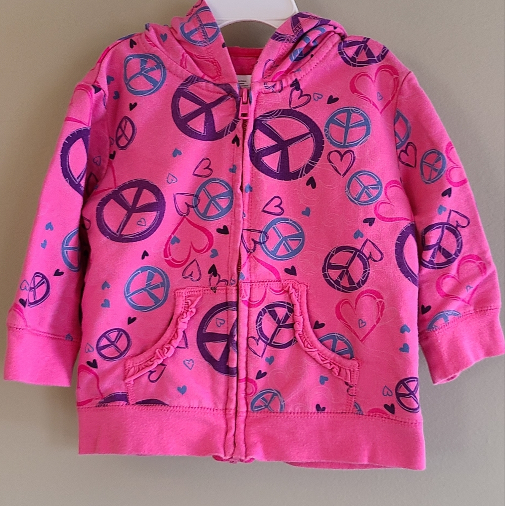 Pink zip up hoodie with hearts and peace signs